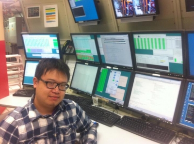 Grad Student Zhou, One of Last Physicists at Controls of CDF Experiment